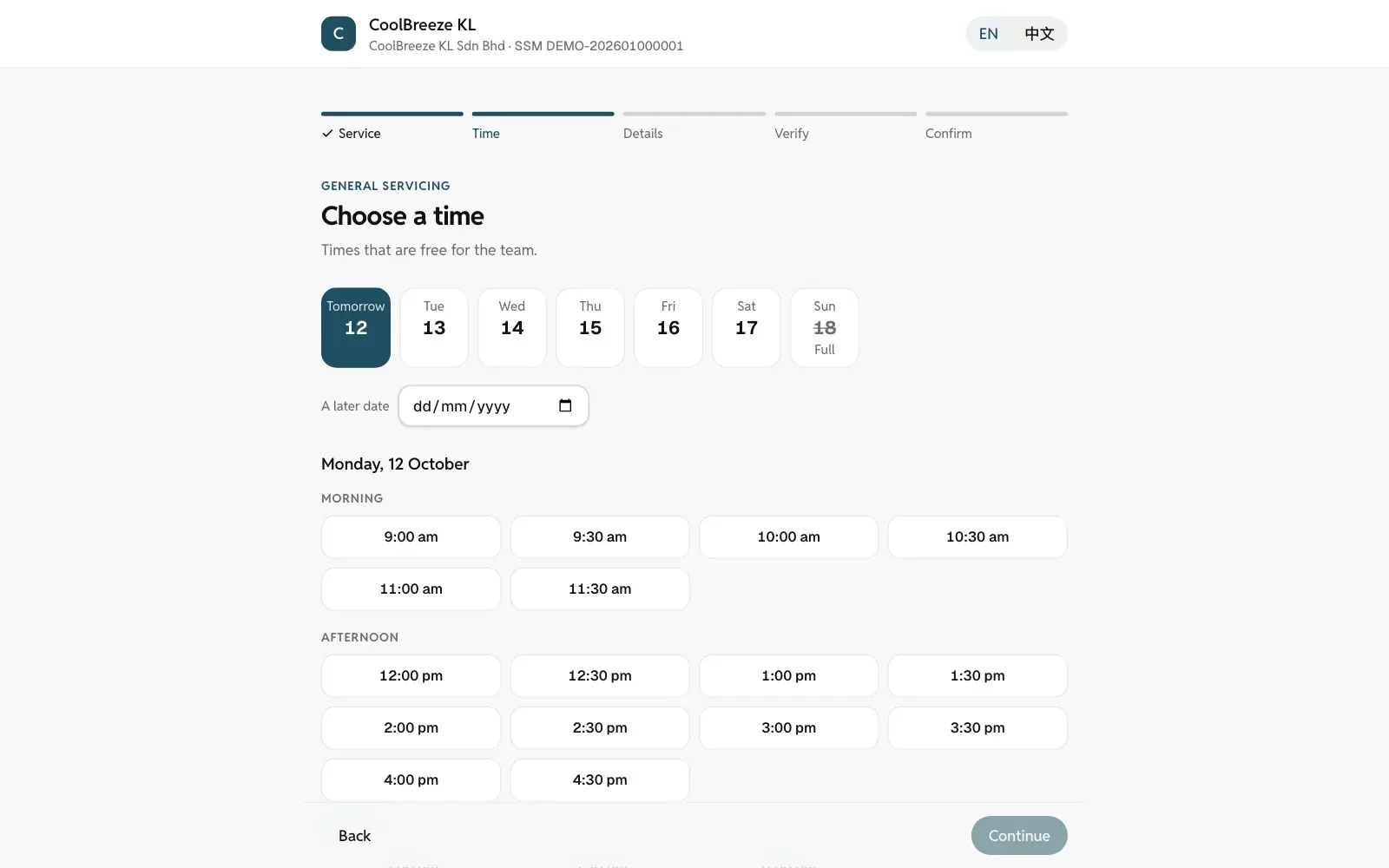 The booking site on a computer: a calendar with the free times for one service.